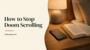 Phone lying face-down on a nightstand beside an open book and a lamp